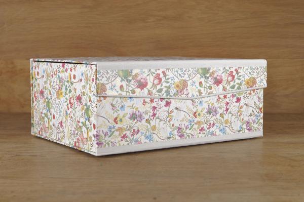 Cute box of colorful flowers